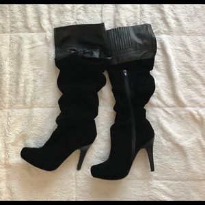 ShoeDazzle black heeled boots with bow